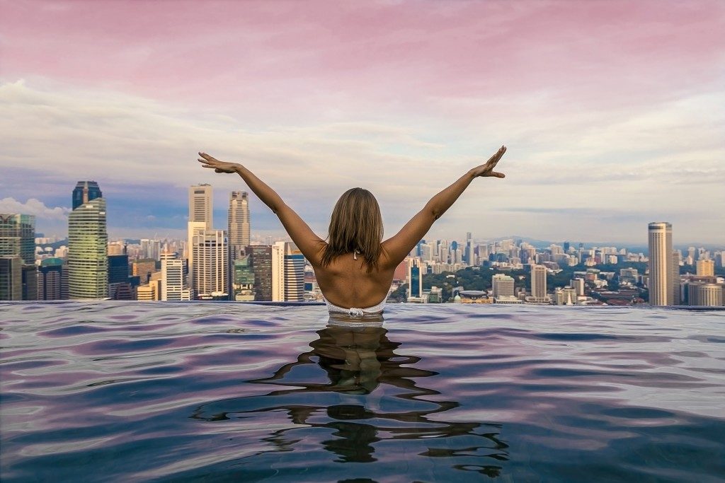 Girl with her back in the pool
