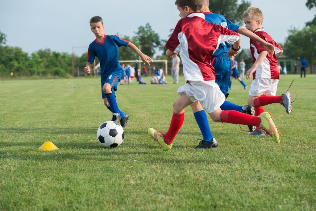 boys playing soccer