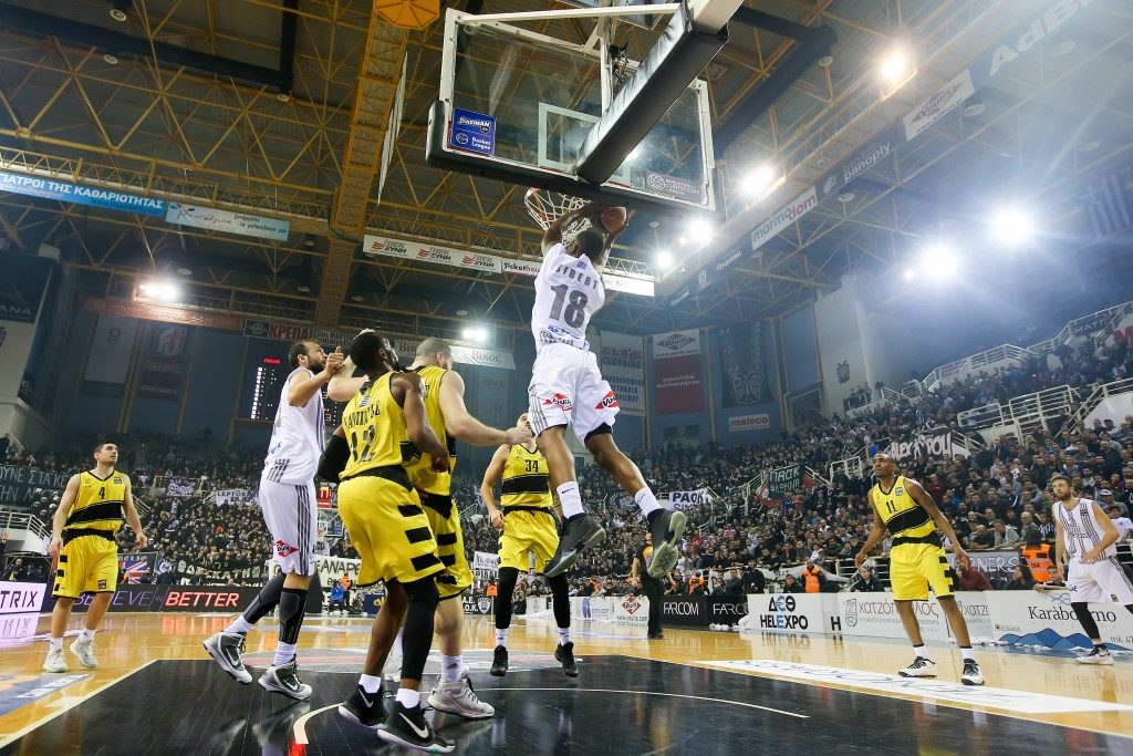 Basketball player about to do a layup