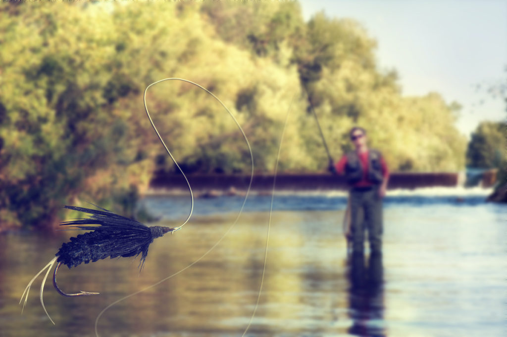 man casting his pole