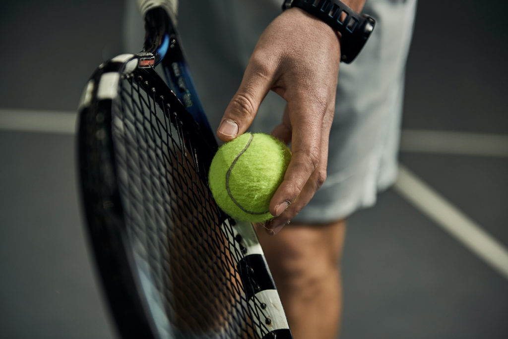 person about to serve the ball